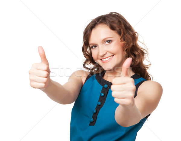 Portrait of a smiling woman while giving two thumbs up Stock photo © rozbyshaka