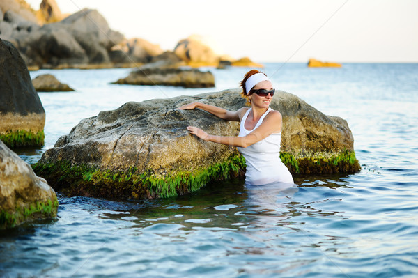 Beautiful woman splashing in the sea Stock photo © rozbyshaka