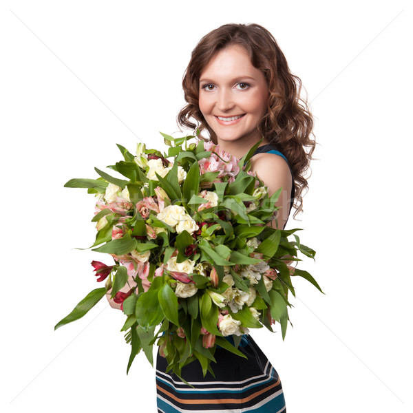 Portrait of pretty brunette holding bouquet of flowers Stock photo © rozbyshaka