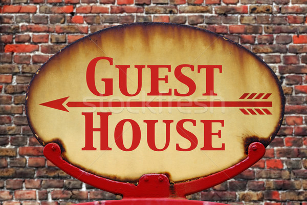 Retro sign Guest house Stock photo © RTimages