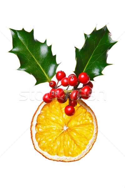 Christmas decoration with dried orange and holly. Stock photo © RTimages