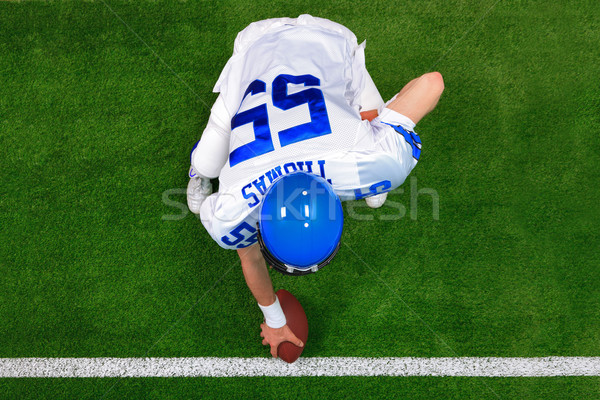 Overhead American football player hike Stock photo © RTimages