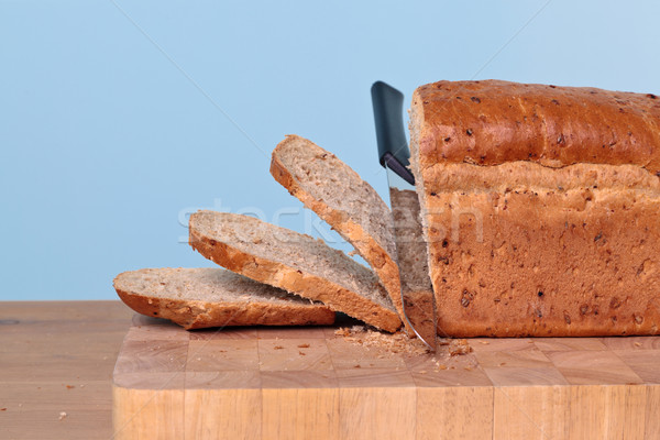 Bread being sliced Stock photo © RTimages