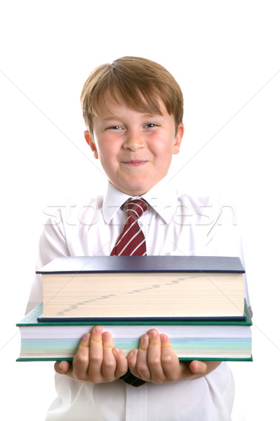 Iskolás fiú tart könyvek magas kulcs lövés Stock fotó © RTimages