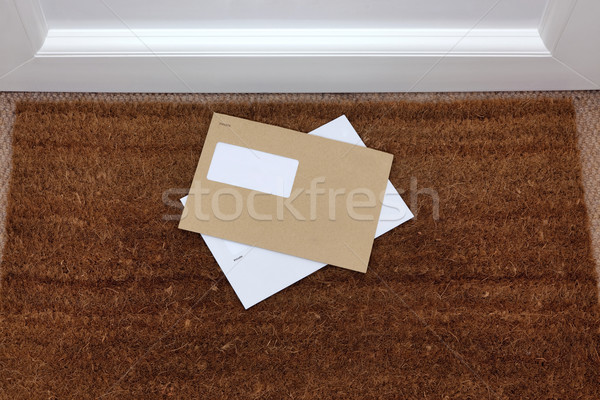 Envelopes on the doormat Stock photo © RTimages