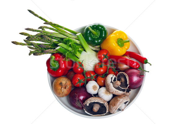 Bowl of vegetables from above isolated on white. Stock photo © RTimages
