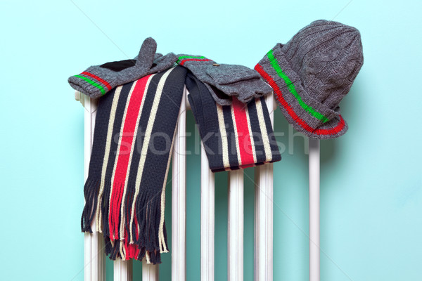 Male hat scarf and gloves drying on a radiator Stock photo © RTimages
