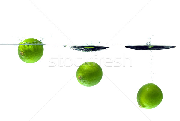 Three lime splash Stock photo © RTimages