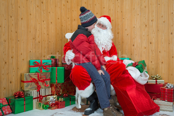 Boy visiting santas grotto Stock photo © RTimages