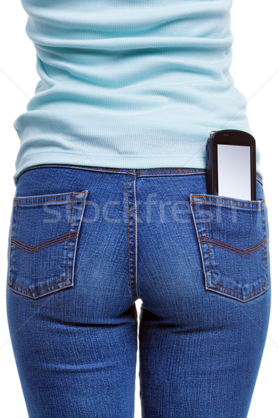Smartphone in womans rear pocket Stock photo © RTimages