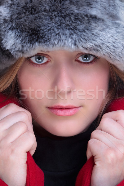 Woman in fur hat and red coat Stock photo © RTimages