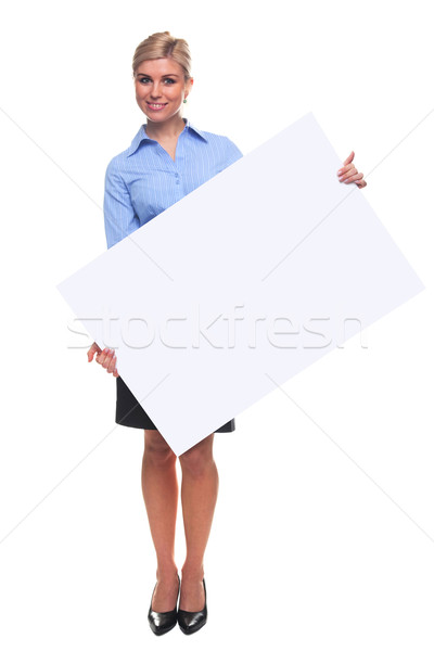 Blond woman holding a blank message board. Stock photo © RTimages