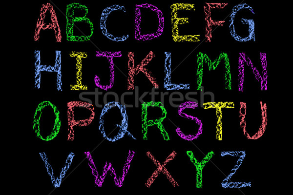 Coloured chalk handwritten letters alphabet on blackboard Stock photo © RTimages
