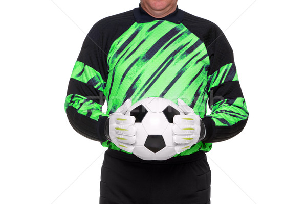 Football goalkeeper holding ball isolated Stock photo © RTimages