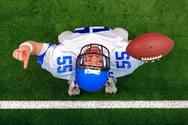 Overhead American football player touchdown celebration Stock photo © RTimages