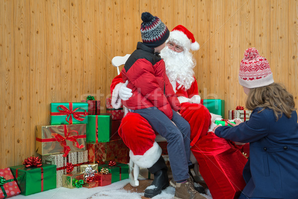 Children visiting Santas grotto Stock photo © RTimages