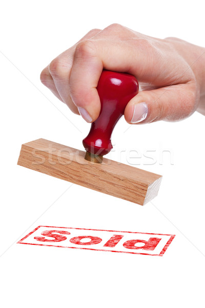 Kéz tart pecsét szó eladva fehér Stock fotó © RTimages