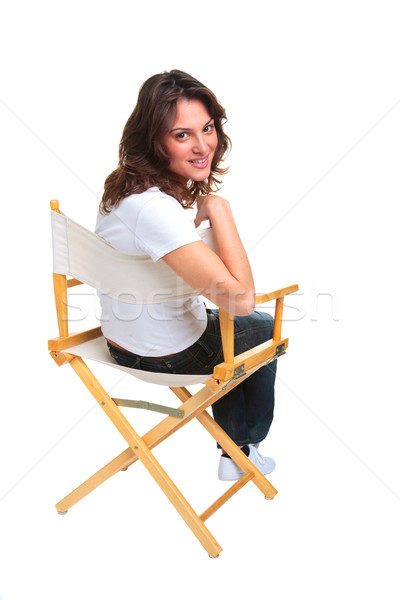 Woman sat on a chair looking back Stock photo © RTimages