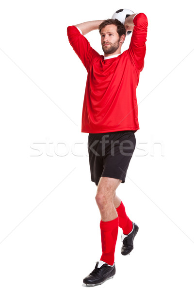 Footballer cut out on white Stock photo © RTimages