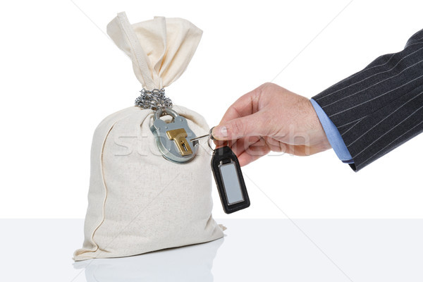 Unlocking a money sack Stock photo © RTimages