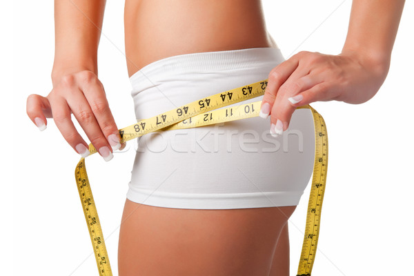 Diéta idő nő mér derék citromsárga Stock fotó © ruigsantos
