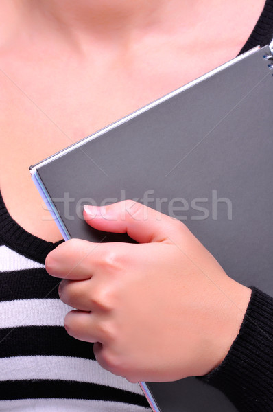 Student holding a pad Stock photo © ruigsantos