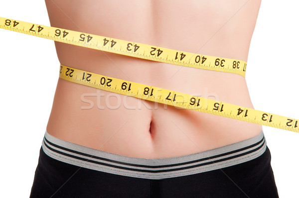 Diéta idő nő mér derék citromsárga Stock fotó © ruigsantos