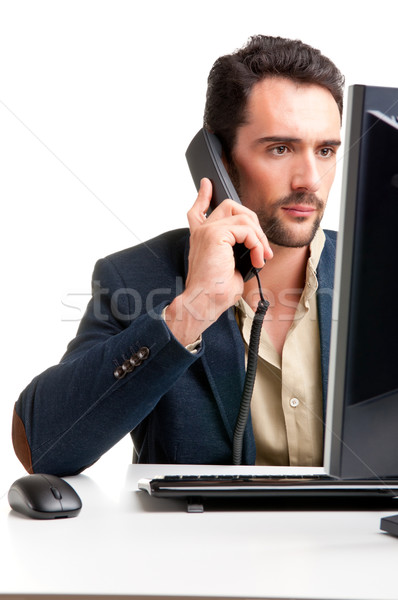 Homem olhando monitor de computador telefone tela do computador pensando Foto stock © ruigsantos