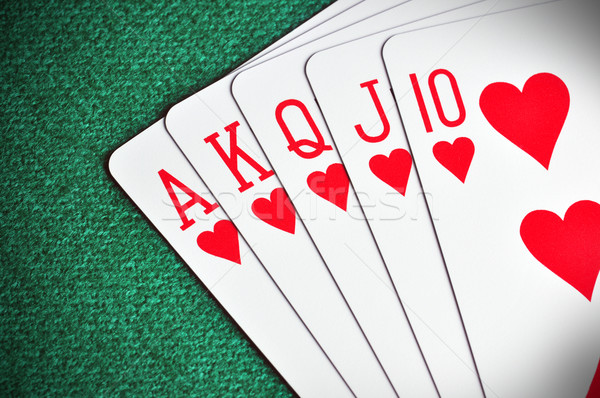 Gewinnen Hand royal poker Karte grünen Stock foto © ruigsantos
