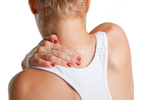 Rugpijn jonge vrouw pijn Maakt een reservekopie nek geïsoleerd Stockfoto © ruigsantos