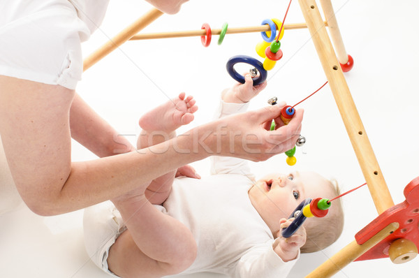 Mutter spielt mit Saeugling Stock photo © runzelkorn