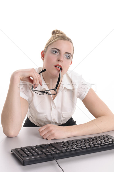 Entediado escritório mastigar óculos mulher jovem loiro Foto stock © runzelkorn