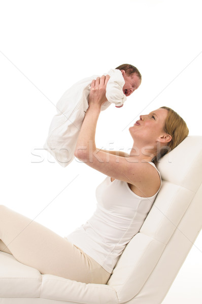 Mãe bebê sofá adulto mulher branco Foto stock © runzelkorn