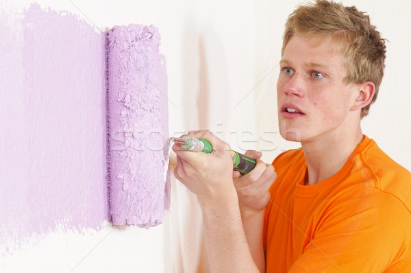 Young couple paint on renovation and Stock photo © runzelkorn