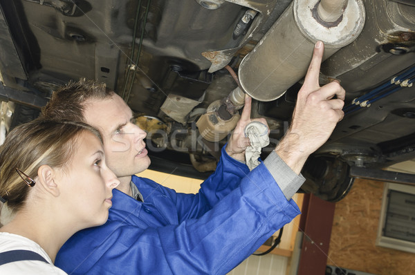 Garage uitputten controleren auto jonge inspectie Stockfoto © runzelkorn