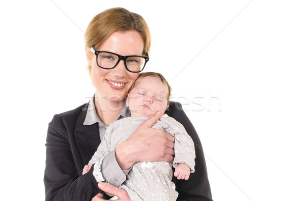 Businesswoman with baby in her arms Stock photo © runzelkorn
