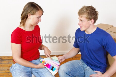 Young couple mixed together on the wall color Stock photo © runzelkorn