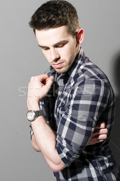Young man in casual wear Stock photo © runzelkorn