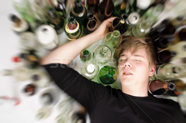 lonely and desperate - portrait of young man with addiction problems Stock photo © runzelkorn