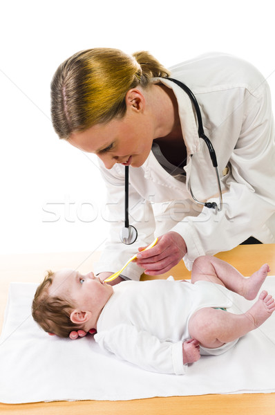 Baby taking medicine Stock photo © runzelkorn