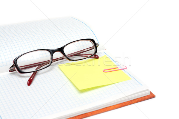 Spectacles on note pad Stock photo © RuslanOmega