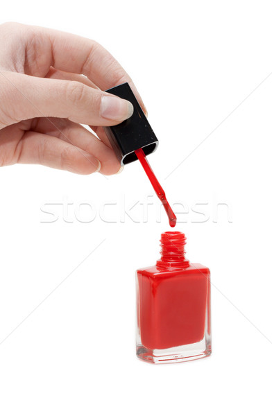 Hand with tassel and red varnish for nail Stock photo © RuslanOmega