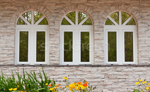 Trois fenêtres mur de pierre réflexion forêt maison [[stock_photo]] © RuslanOmega