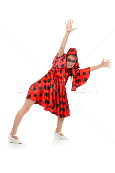 teen girl dancing in a red polka-dot dress Stock photo © RuslanOmega