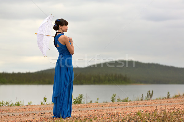 Beautiful dark haired model strolling through the woods. Stock photo © RuslanOmega