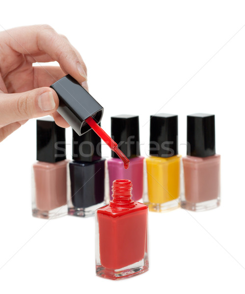 Hand with tassel and red varnish for nail Stock photo © RuslanOmega