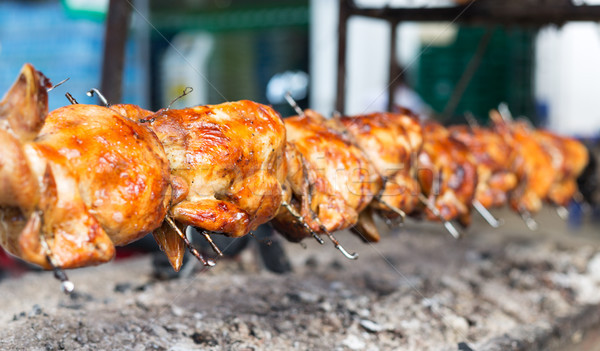 grilled chicken roasted on a spit Stock photo © RuslanOmega