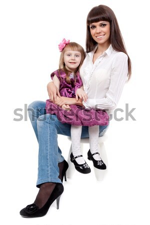 Stock photo: Mother and daughter sitting on a chair