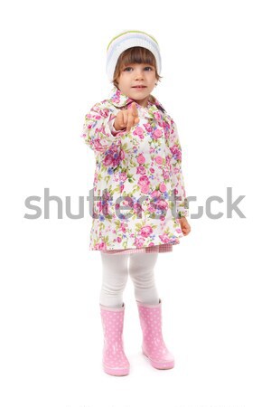 little girl in boots and a jacket shows finger Stock photo © RuslanOmega