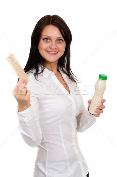 Beautiful girl with yogurt and crackers  Stock photo © RuslanOmega